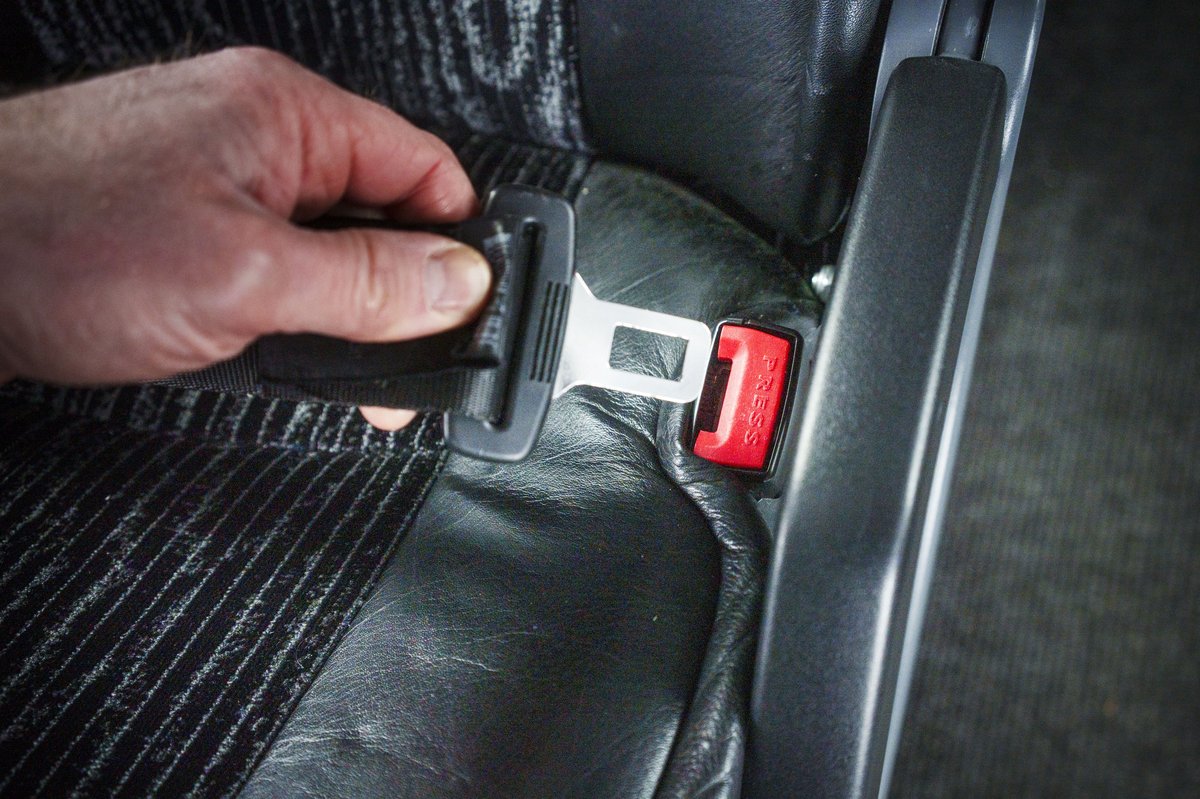 Fastening a seatbelt